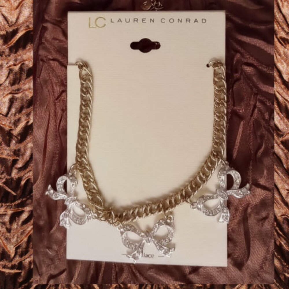3 Silver Bows on Gold Chain Necklace